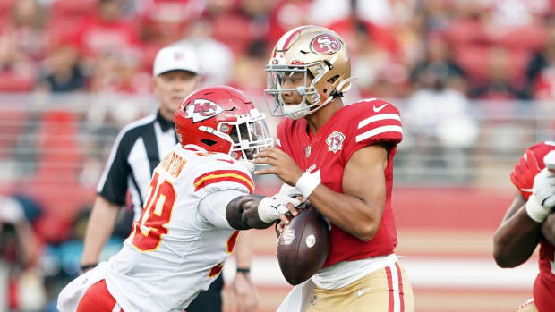 Aug 14, 2021; Santa Clara, California, USA; Kansas City Chiefs defensive end Tershawn Wharton (98) knocks the ball away from San Francisco 49ers quarterback Trey Lance (5) during the second quarter at Levi's Stadium. Mandatory Credit: Darren Yamashita-USA TODAY Sports
